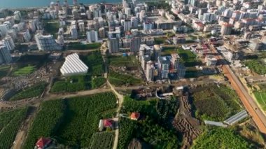 City panorama on the seashore 4K aerial view