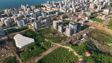 City panorama on the seashore 4K aerial view