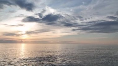 Cloudy sunset at sea colorful colors aerial view