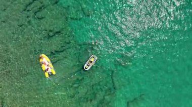 parasailing awesome motor boat aerial view