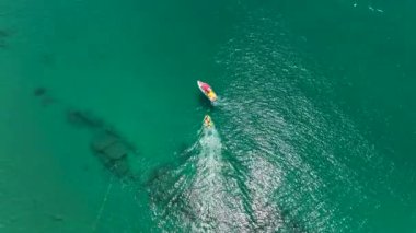parasailing awesome motor boat aerial view