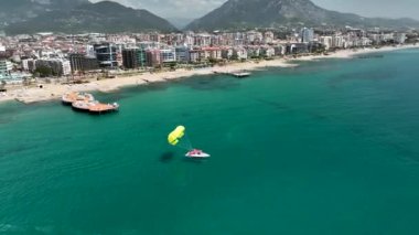 parasailing awesome motor boat aerial view