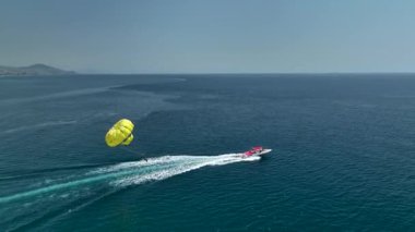 parasailing awesome motor boat aerial view