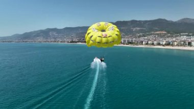 parasailing awesome motor boat aerial view