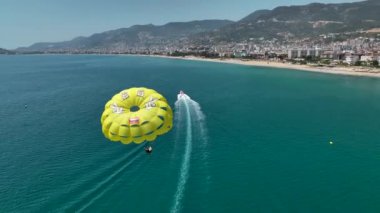 parasailing awesome motor boat aerial view