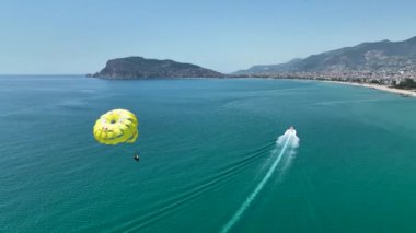 parasailing awesome motor boat aerial view