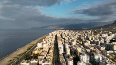 City panorama on the seashore 4K aerial view