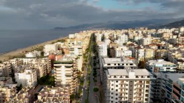 City panorama on the seashore 4K aerial view