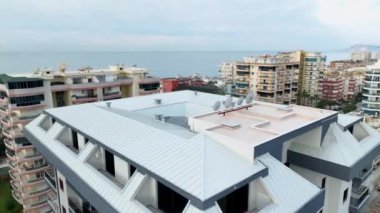 City panorama on the seashore 4K aerial view