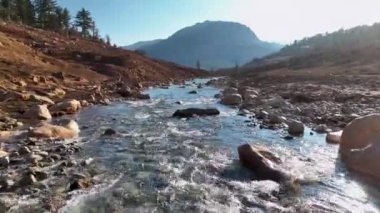 Cold water splashing near rapids. Concept of water background.