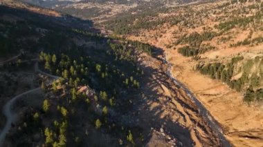 Smooth drone flight in the mountains, beautiful sunset light 4K