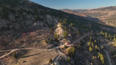 Smooth drone flight in the mountains, beautiful sunset light 4K