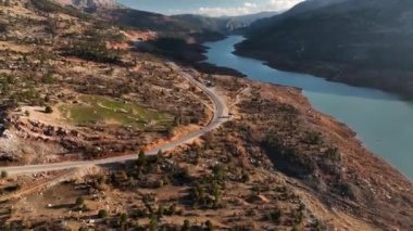 Smooth drone flight in the mountains, beautiful sunset light