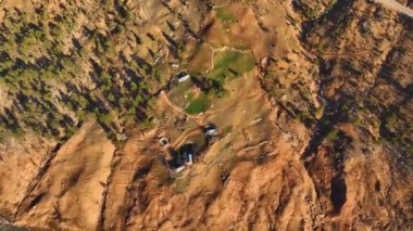 Smooth drone flight in the mountains, beautiful sunset light