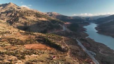 drone flight in the mountains, beautiful sunset light