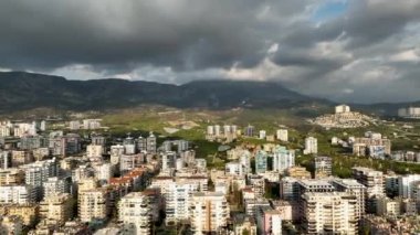 City panorama on the seashore 4K aerial