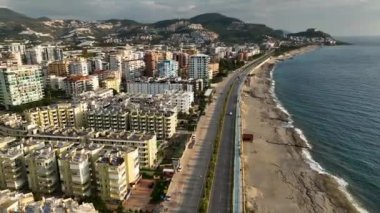 City panorama on the seashore 4K aerial