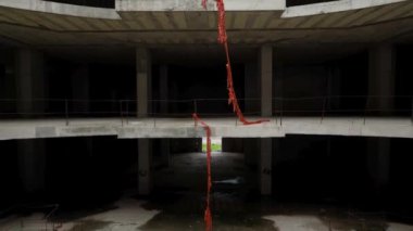 Old unfinished mall, empty space, bare concrete, aerial view. 4K aerial view