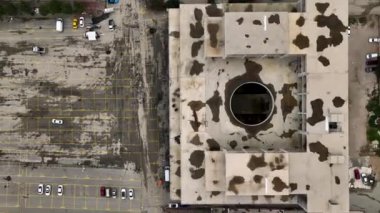 Old unfinished mall, empty space, bare concrete, aerial view. 4K aerial view