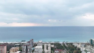 City panorama on the seashore 4K aerial view