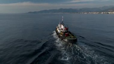 Ship mechanic sails to help another ship