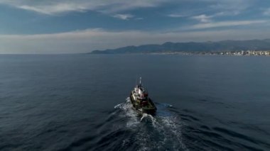 Maritime industry in mediterranean sea, aerial view of beautiful sunlight
