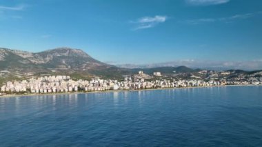 City panorama on the seashore 4K aerial view