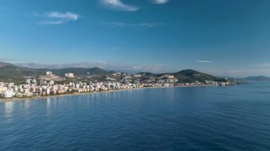 City panorama on the seashore 4K aerial view
