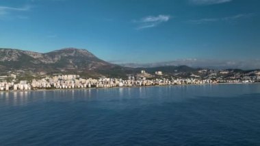 City panorama on the seashore 4K aerial view