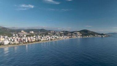 City panorama on the seashore 4K aerial view