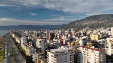 City panorama on the seashore 4K aerial view