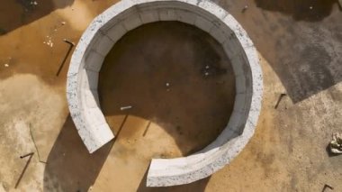 Smooth flight on a drone over the pool, building a house
