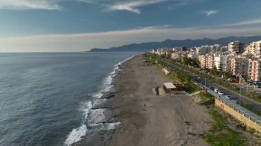 City panorama on the seashore 4K aerial view