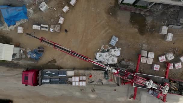 建設現場に貨物を積み出す貨物クレーン — ストック動画