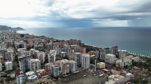 在我们的无人机拍摄城市风景 浩瀚蔚蓝的大海和展示房地产机遇的过程中 从天上见证了阿拉亚的美丽 完美的展示性能和促销 — 图库视频影像