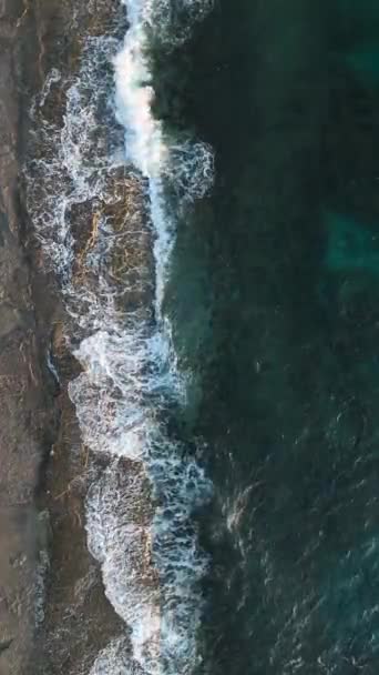 Immerse Yourself Tranquility Stone Beach Captivating Vertical Video Showcasing Azure — Stock Video
