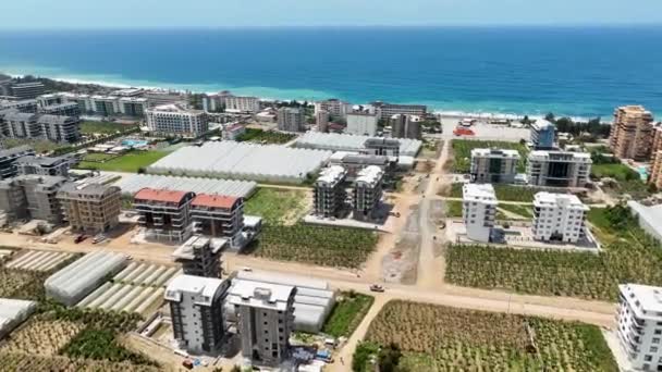 Mergulhe Paisagens Sonho Costeiras Como Drone Revela Criação Casas Apartamentos — Vídeo de Stock