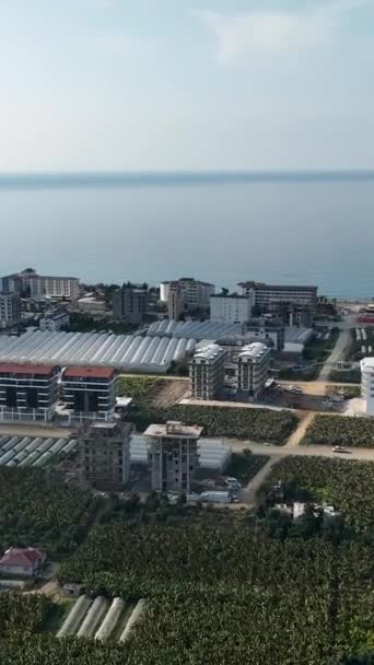 Полюбуйтесь Прибрежное Строительство Наблюдая Воздуха Строительством Домов Алании Турция — стоковое видео