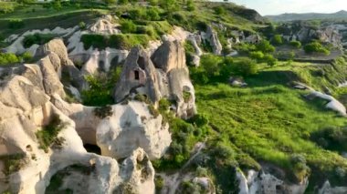 known for its distinctive fairy chimneys tall, cone shaped rock formations clustered in Monks Valley, Goreme and elsewhere.