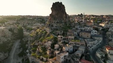 known for its distinctive fairy chimneys tall, cone shaped rock formations clustered in Monks Valley, Goreme and elsewhere.