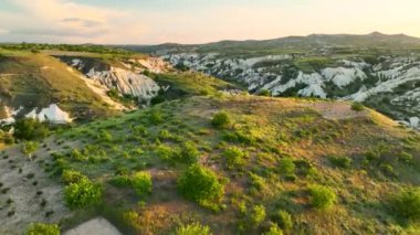 known for its distinctive fairy chimneys tall, cone shaped rock formations clustered in Monks Valley, Goreme and elsewhere.