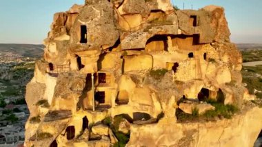 known for its distinctive fairy chimneys tall, cone shaped rock formations clustered in Monks Valley, Goreme and elsewhere.