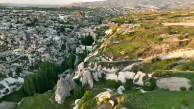 known for its distinctive fairy chimneys tall, cone shaped rock formations clustered in Monks Valley, Goreme and elsewhere.