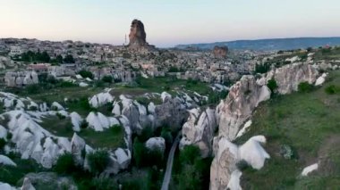 known for its distinctive fairy chimneys tall, cone shaped rock formations clustered in Monks Valley, Goreme and elsewhere.