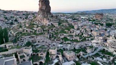 known for its distinctive fairy chimneys tall, cone shaped rock formations clustered in Monks Valley, Goreme and elsewhere.