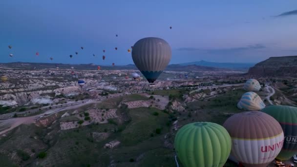 Hot Air Balloons Fly Mountainous Landscape Cappadocia Turkey Aerial View — Video