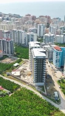 Türkiye 'nin Alanya ilçesinde yüksek binalar inşa edilirken yükselen dönüşümü izleyin.