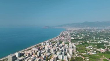 İnşaat halindeki sahil cazibesini keşfetmek, bir kasabanın dönüşümüne tanıklık etmek, 4K 'da bir gelecek inşa etmek..