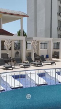 Zarif beyaz tasarımlı sahil villaları Akdeniz tarafından inşa ediliyor..