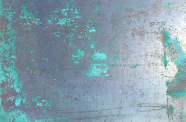 Eskimiş paslı metal doku arka planı. Duvarlar veya yüzeyler için doku olarak hasarlı parçaları olan çok eski metal bir levha.